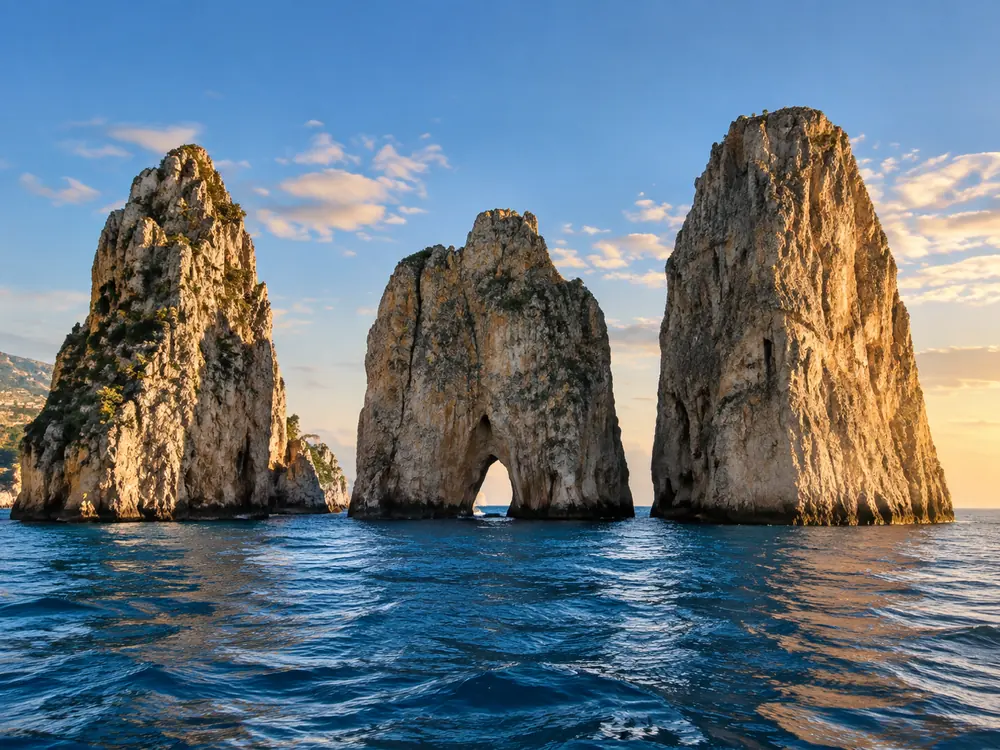 The Faraglioni stacks off Capri, on the far side of the island from the grotto